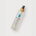 Bottle of grip spray to prevent slipping on yoga mat