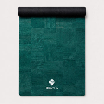 A teal green yoga mat with a textured patchwork design, partially unrolled to show its black underside. The brand name 'ThriveLiv' is printed in white near the bottom center.