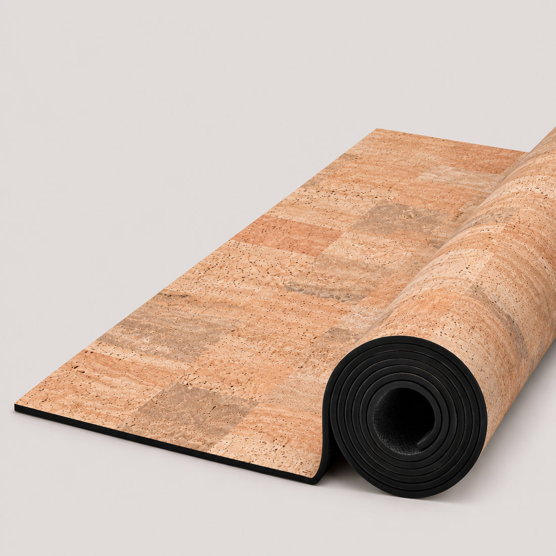 A cork mat with a natural cork patchwork pattern in shades of beige, tan, and brown, featuring a black rolled edge at the top and a white ThriveLiv logo at the bottom.