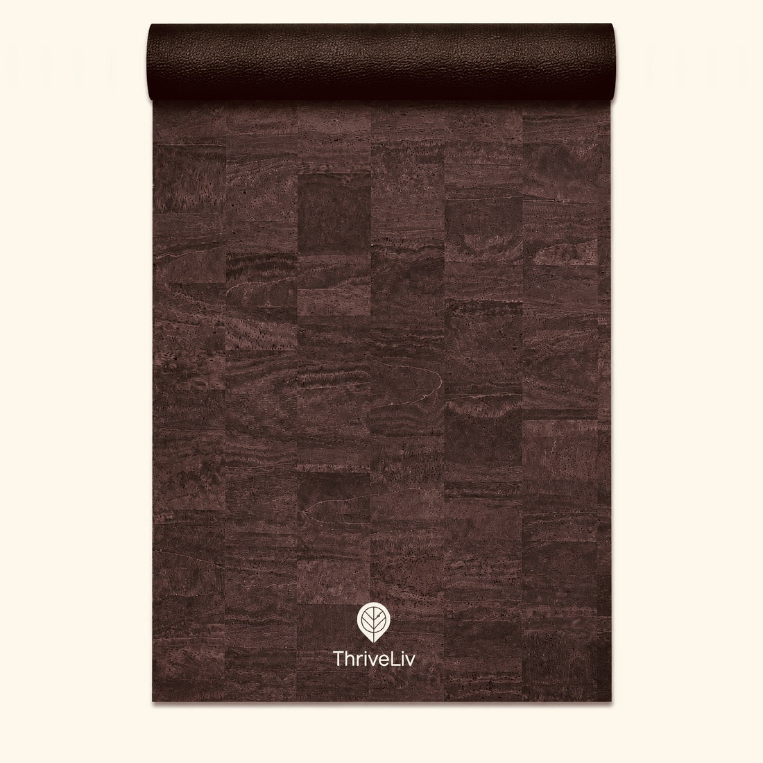 A dark brown cork yoga mat with a textured patchwork pattern, partially unrolled on a light cream background. The brand name 'ThriveLiv' is printed in white near the bottom center.